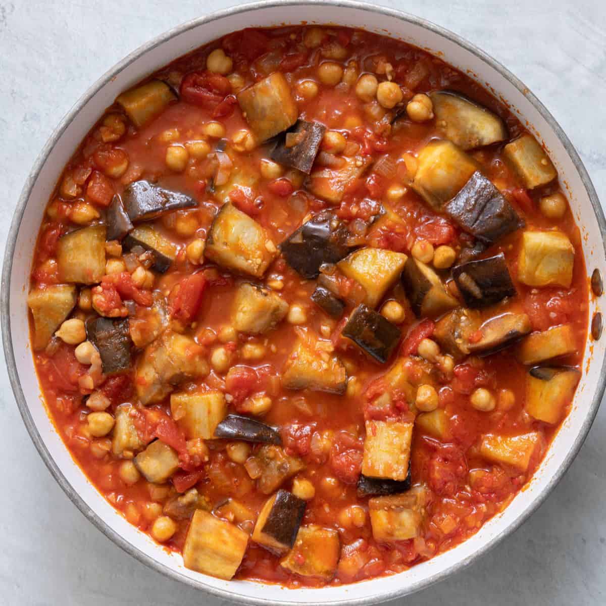 Final stew in pot with eggplant mixed in.