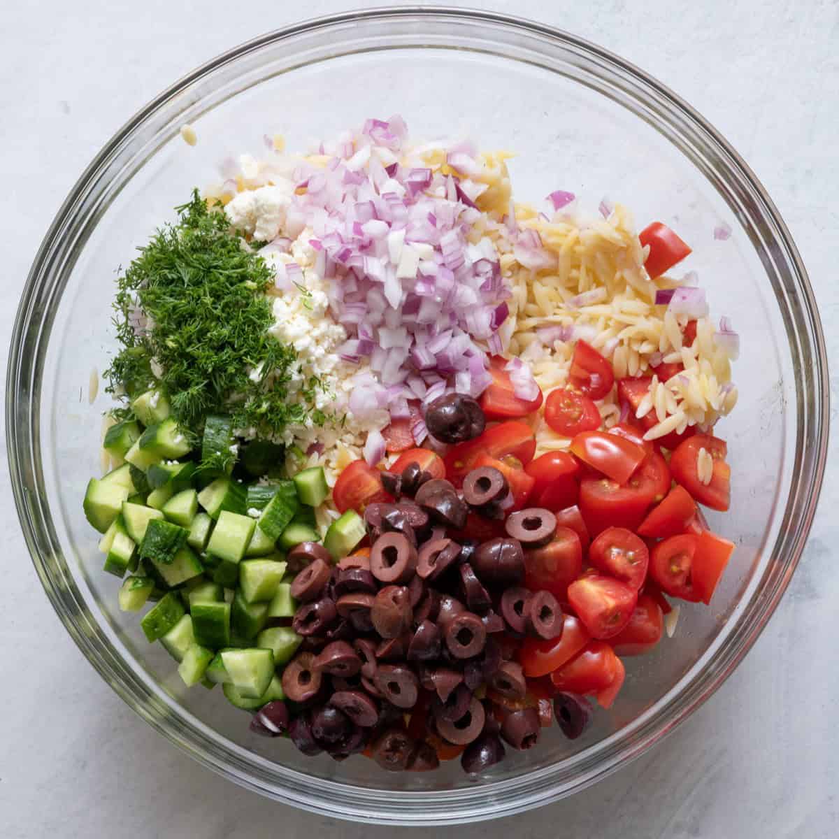 Orzo added on top along with remaining ingredients.