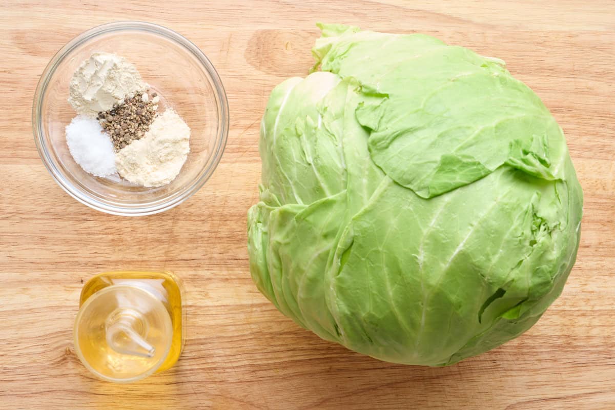 Ingredients for recipe: head of cabbage, oil, onion powder, garlic powder, salt and black pepper.