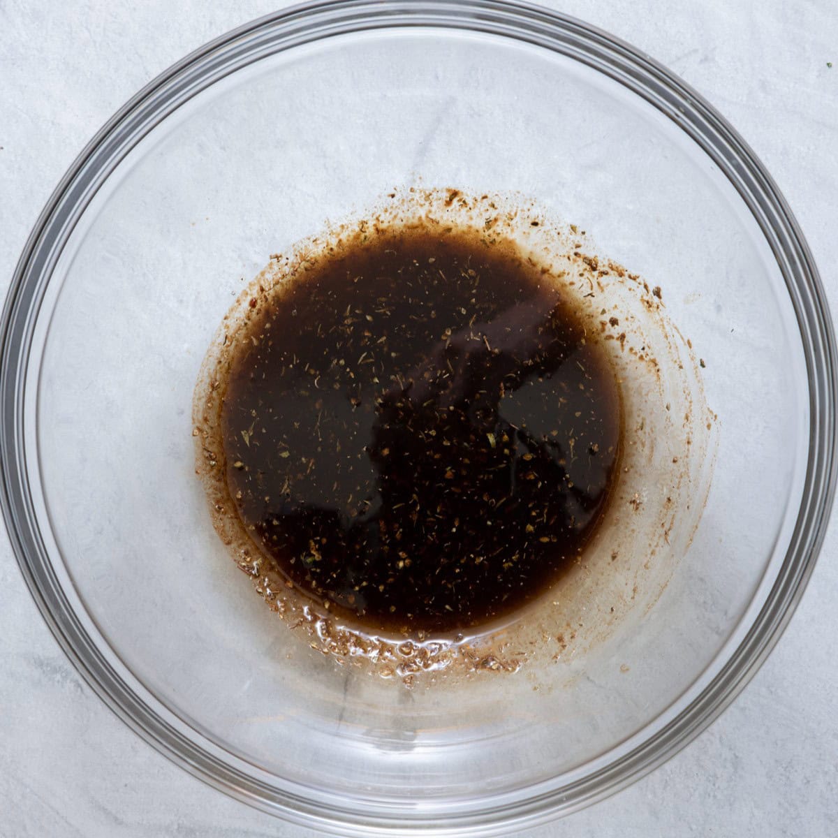 Whisked olive oil, vinegar and seasoning.