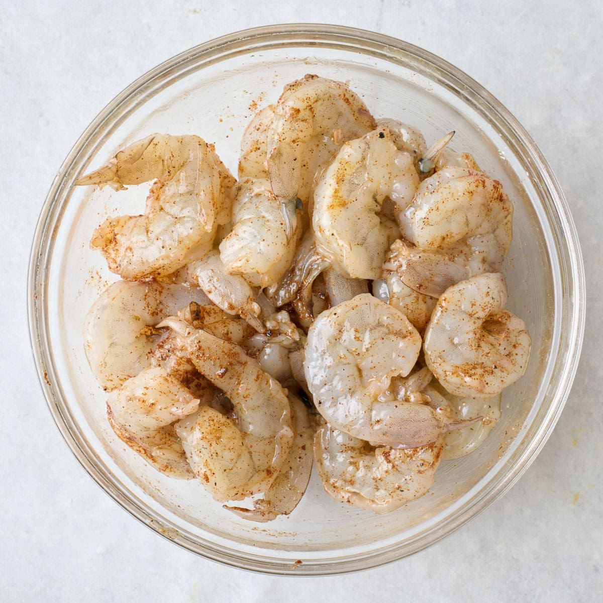 After tossing shrimp in seasoning.
