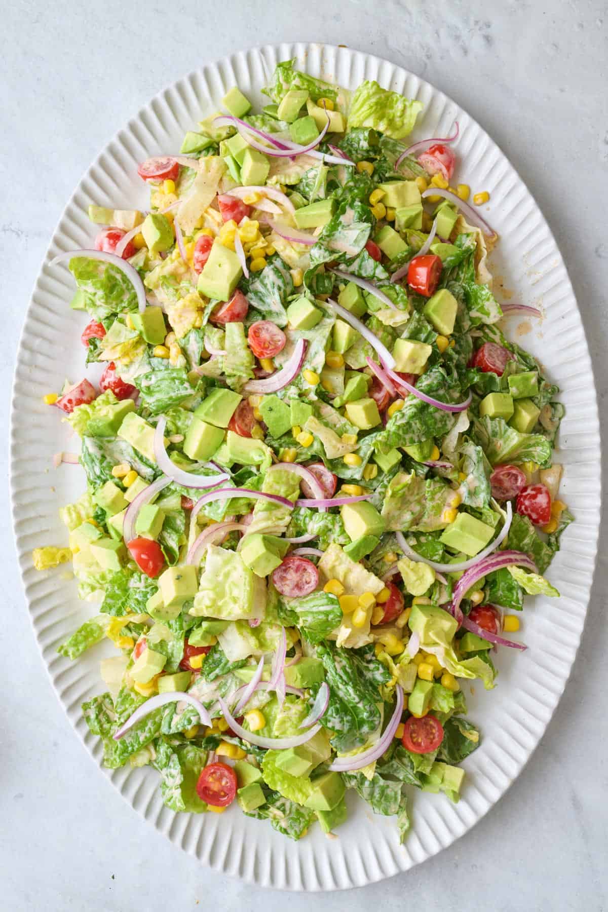 Salad mixture on a large platter.