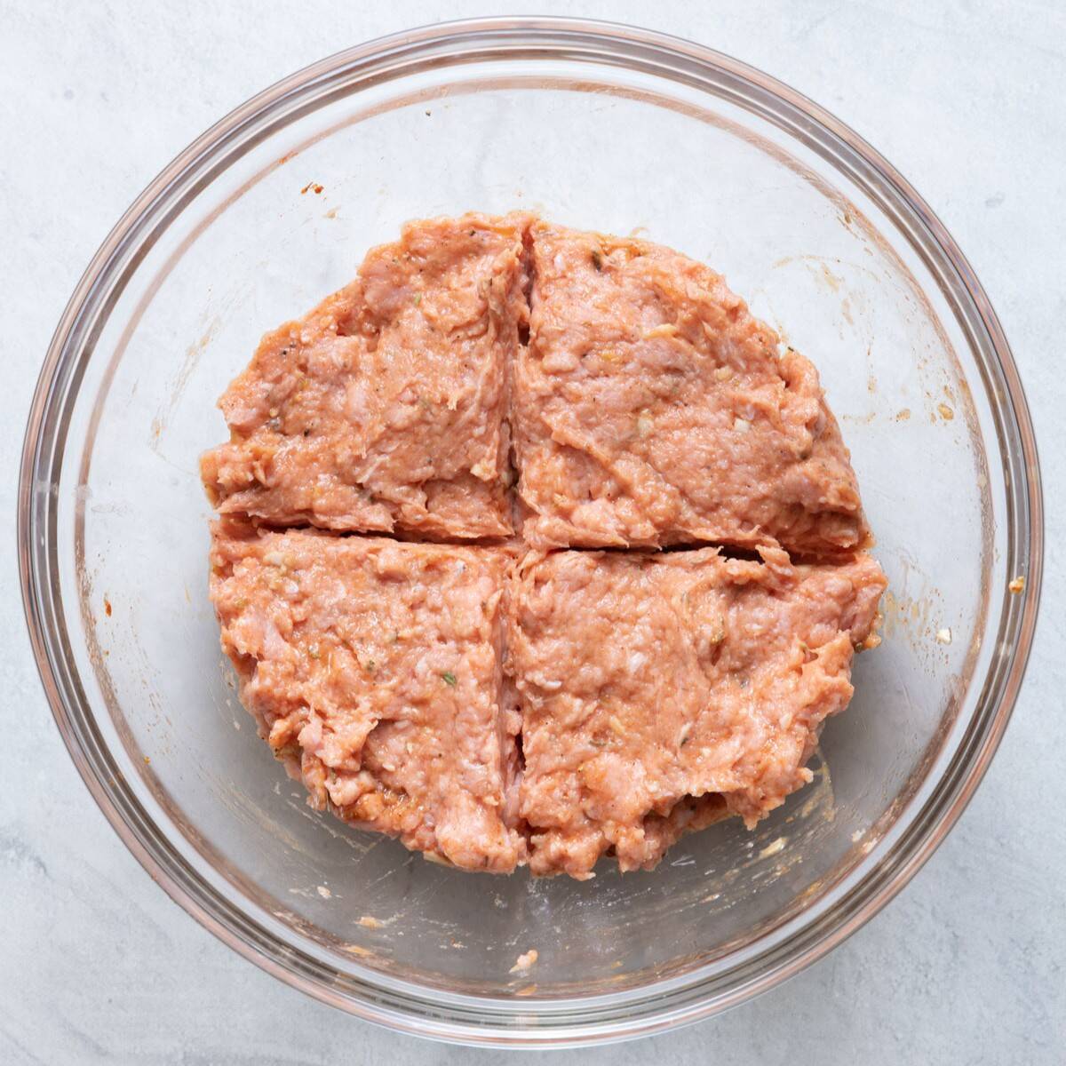 Cross drawn in the turkey mixture to divide into four pieces.