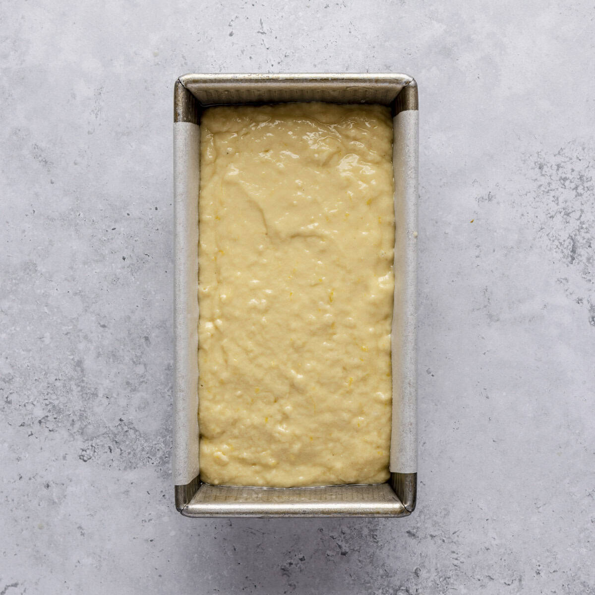 Quick bread batter in prepared pan before baking