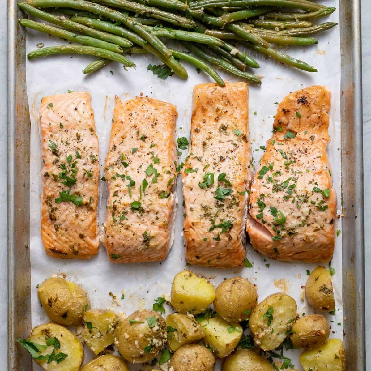 Sheet pan salmon recipe with lemon and garlic.