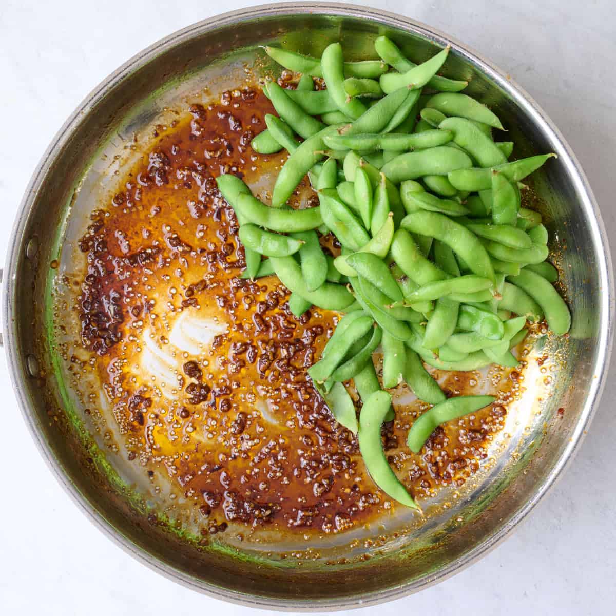 Drained edamame added after combing sauce.