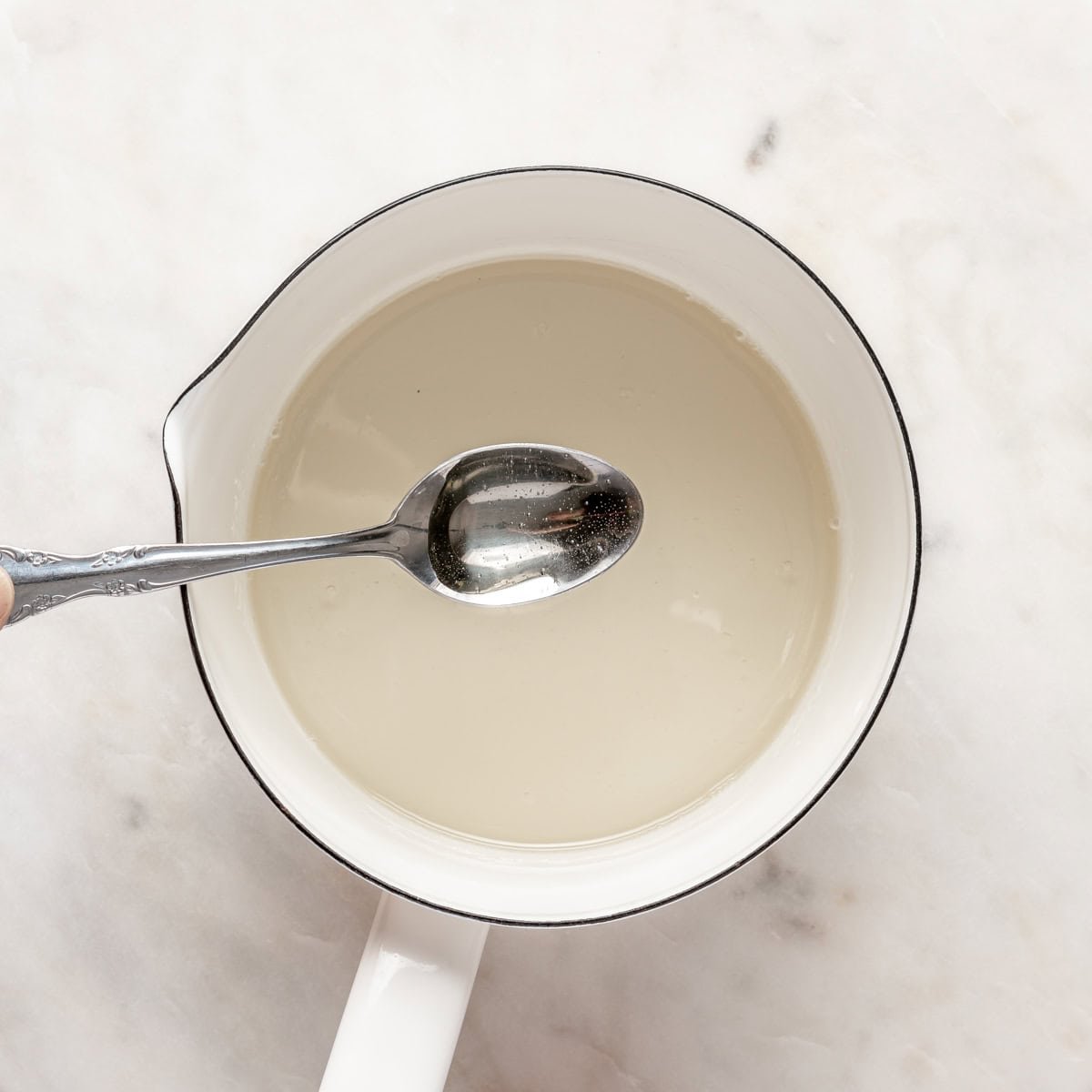 After reducing with a spoon lifting up to show consistency.