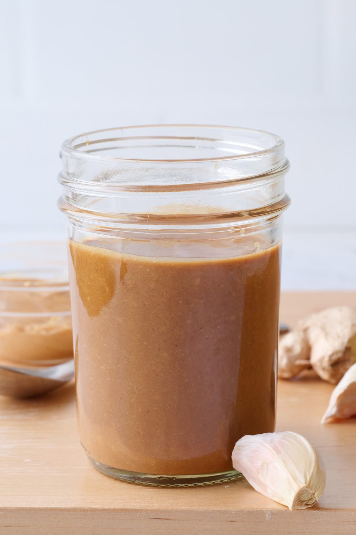 Jar of homemade Thai peanut dressing.
