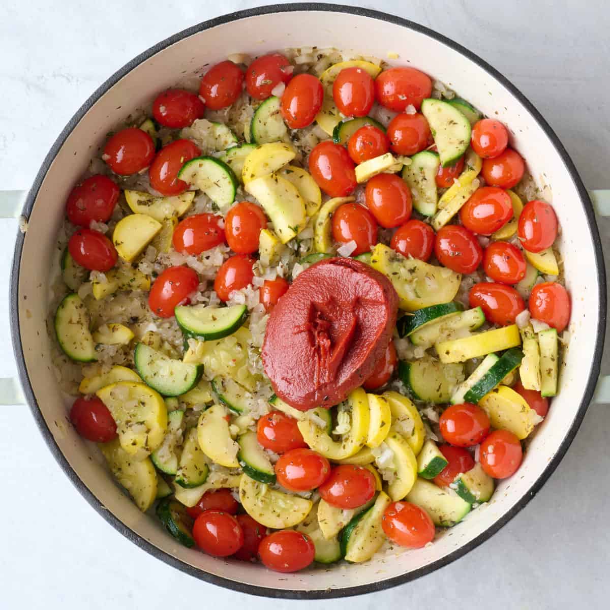 Tomatoes paste added on top.