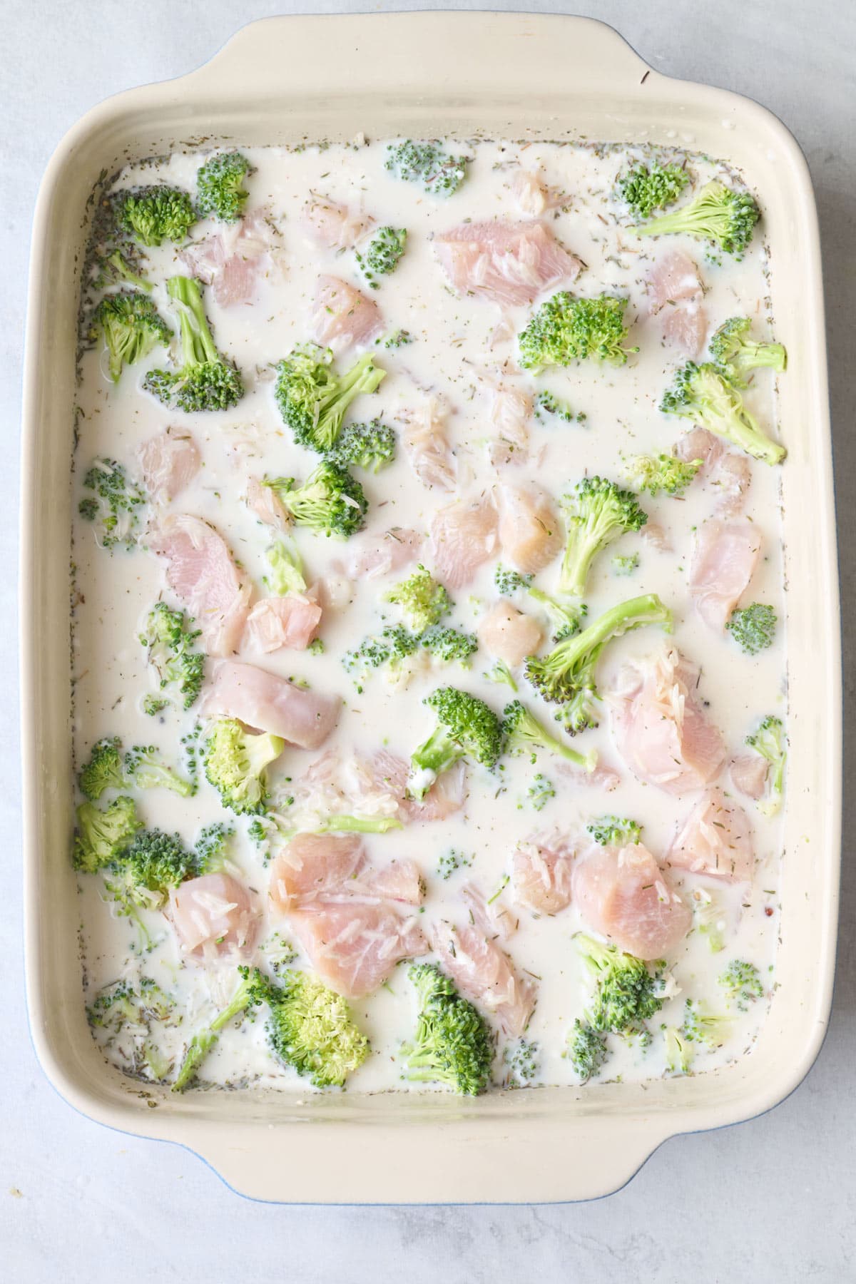 After tossing together add ins into sauce in baking dish.