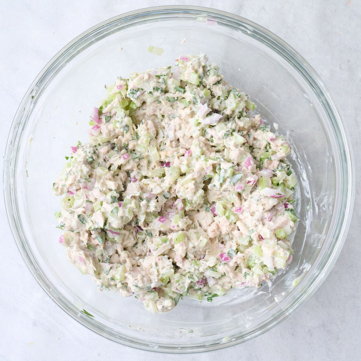 Salad after tossing with dressing and vegetables.