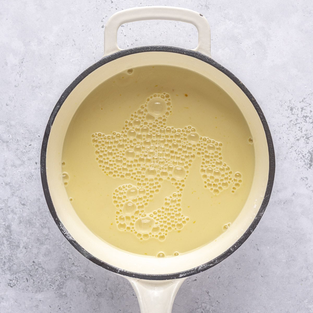 After whisking together, before cooking.