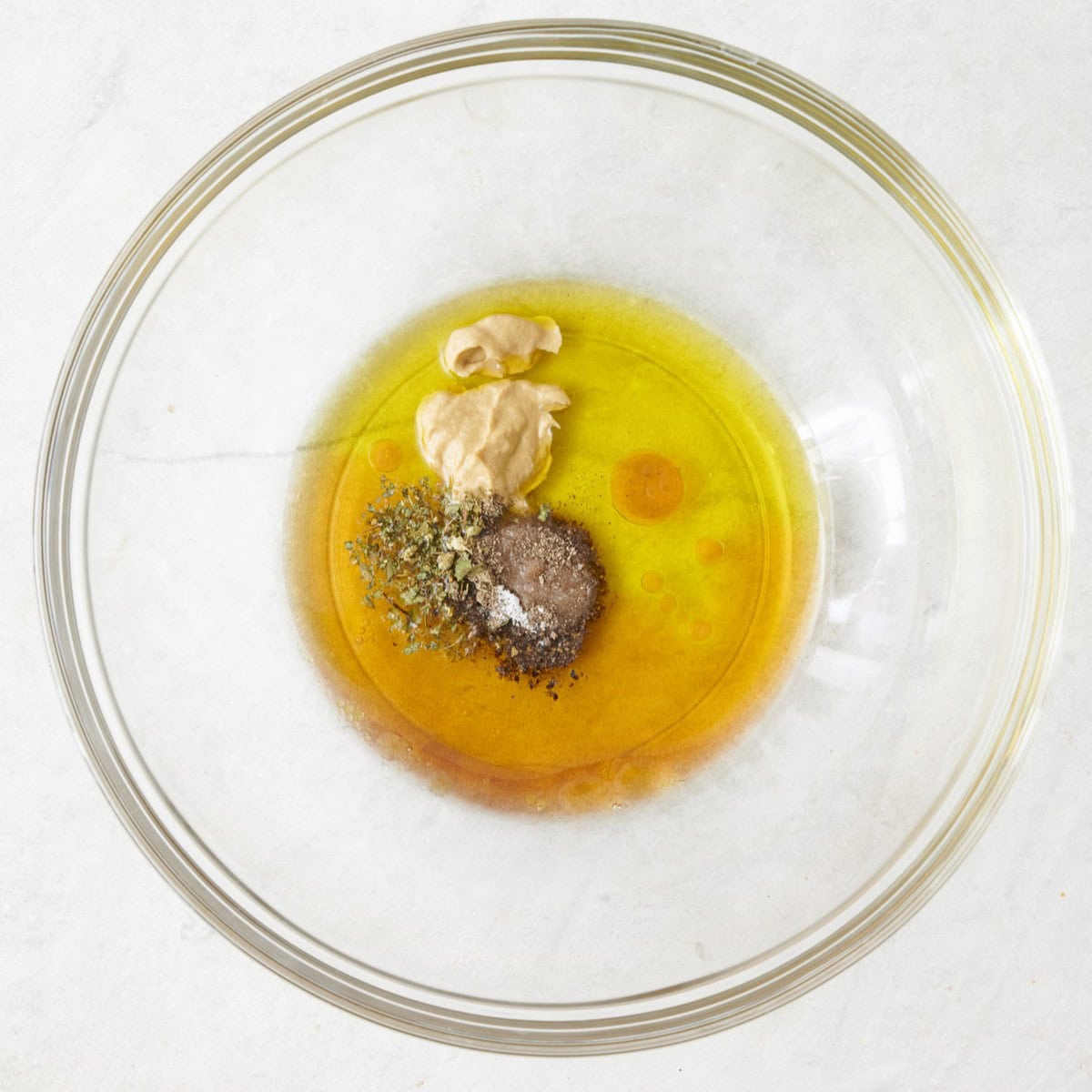 Dressing ingredients in a bowl.