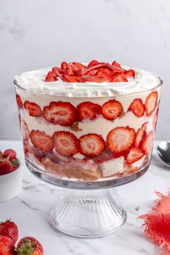 Easy homemade strawberry trifle recipe made with vanilla pudding in a trifle dish.
