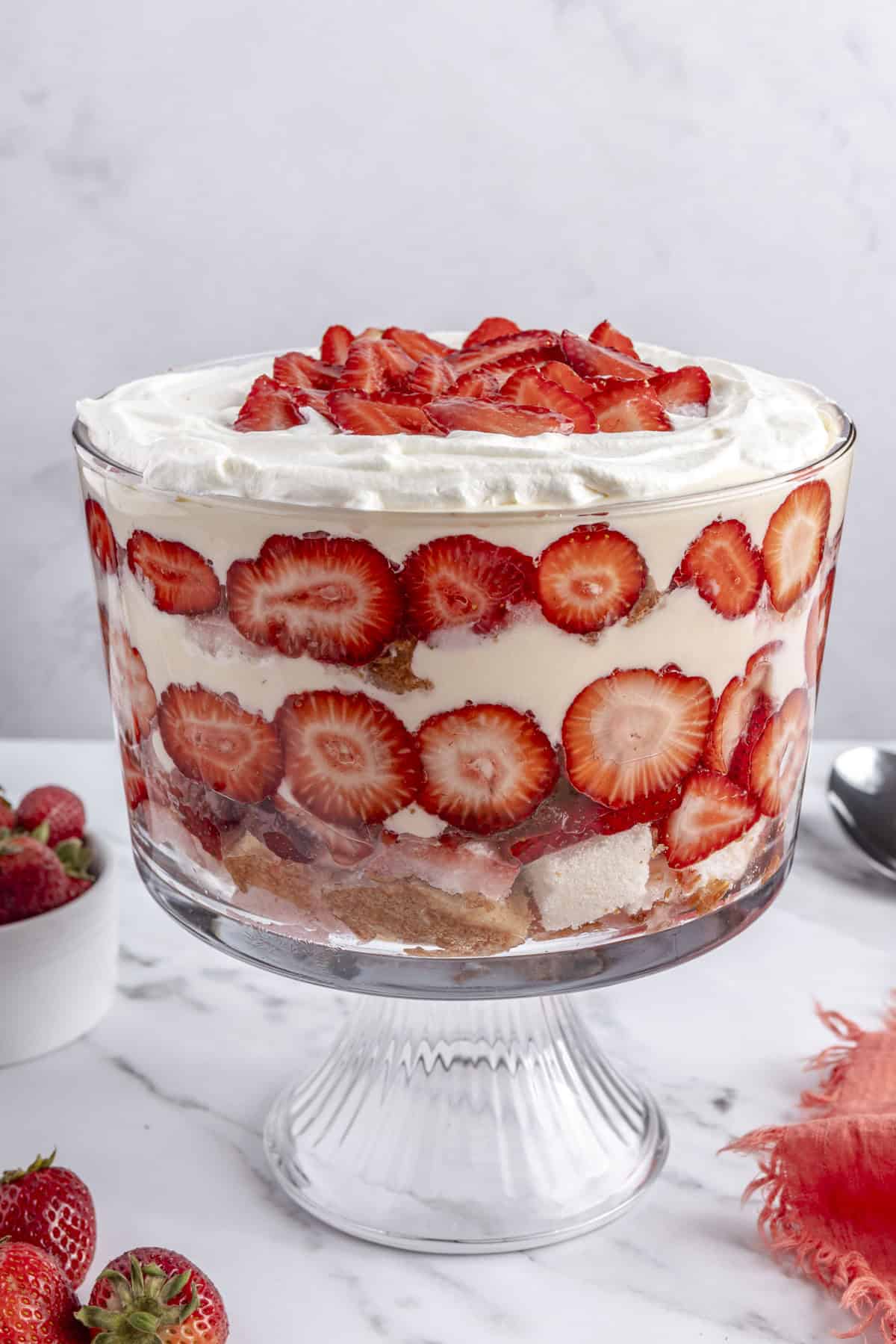 Easy homemade strawberry trifle recipe made with vanilla pudding in a trifle dish.
