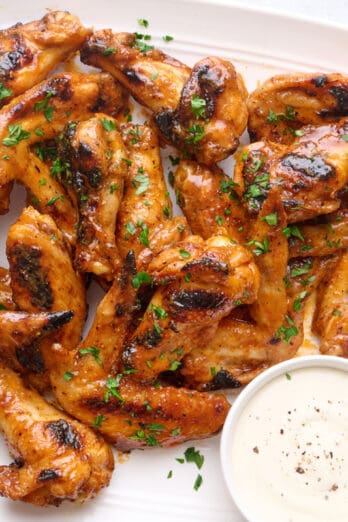 Buffalo sauce grilled chicken wings.