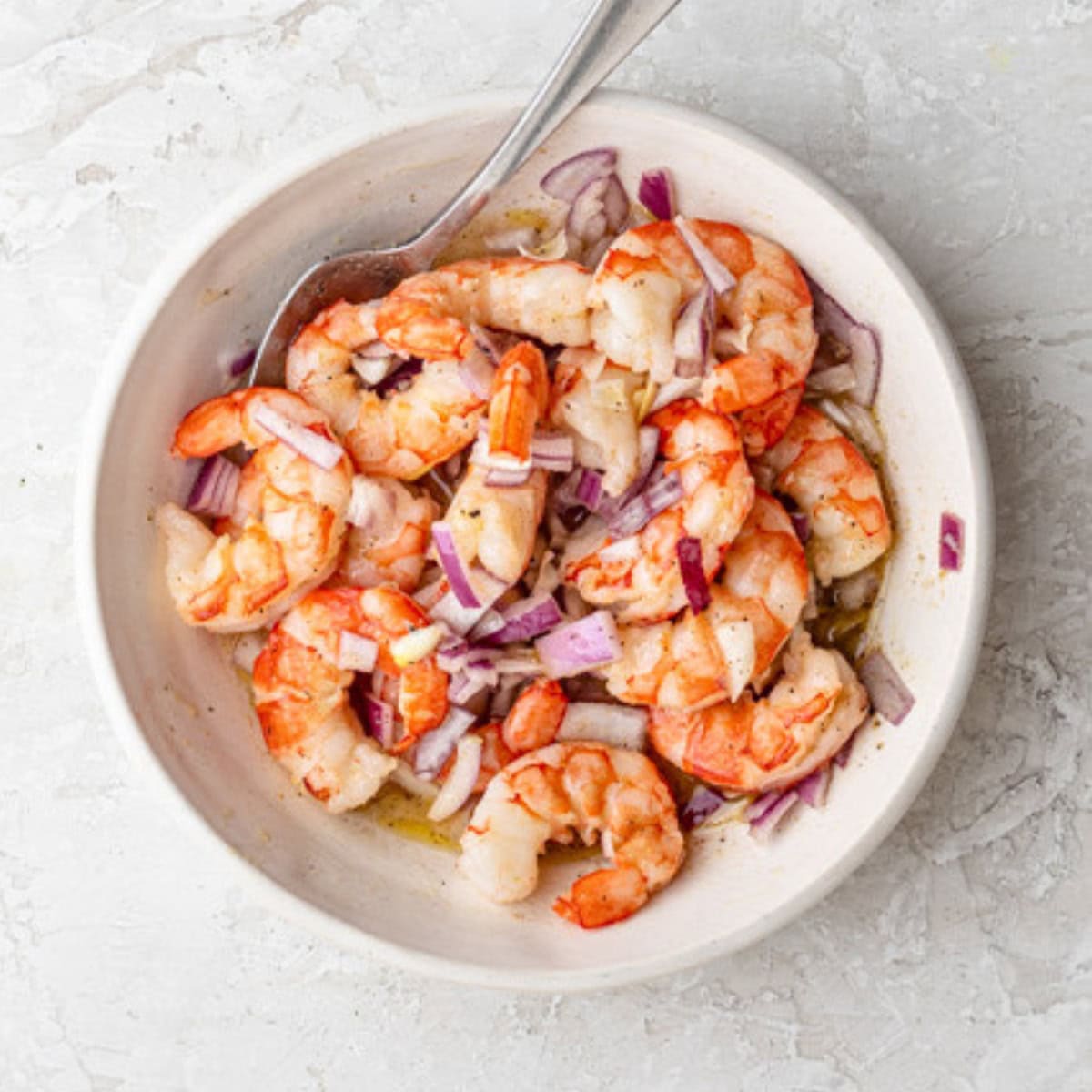 After tossing together shrimp salad.