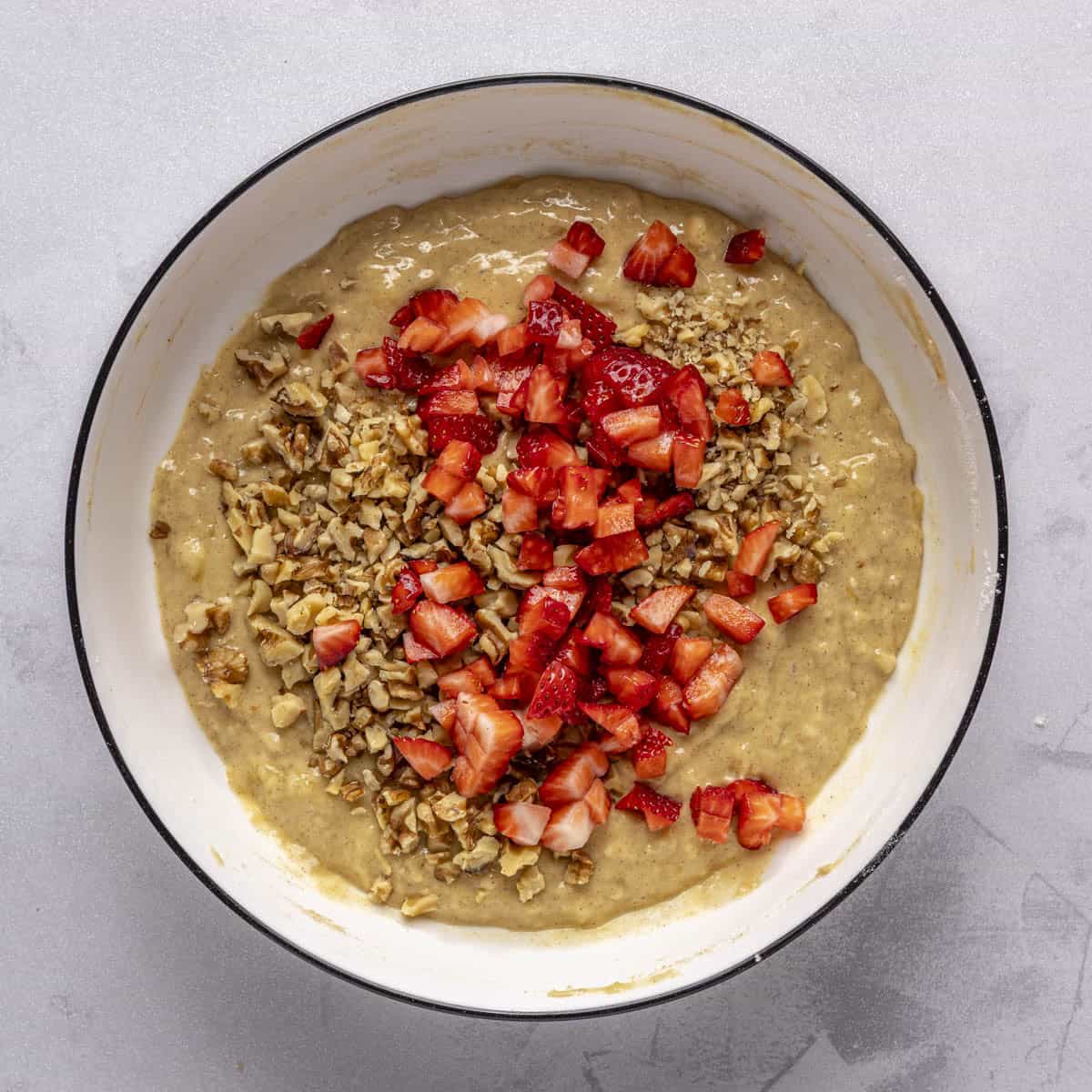 After folding together with diced strawberries and walnuts added.
