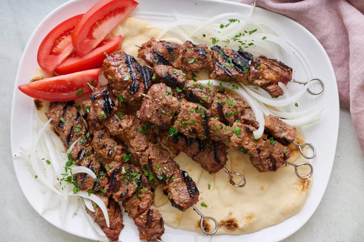Best West African beef kabobs on a large pita.