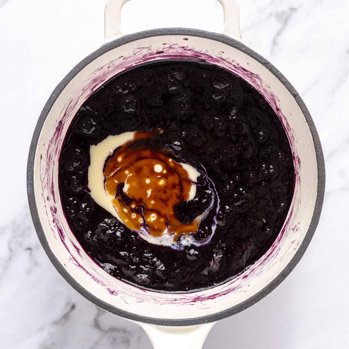 After cooking blueberries with sweetened condensed milk and vanilla added.