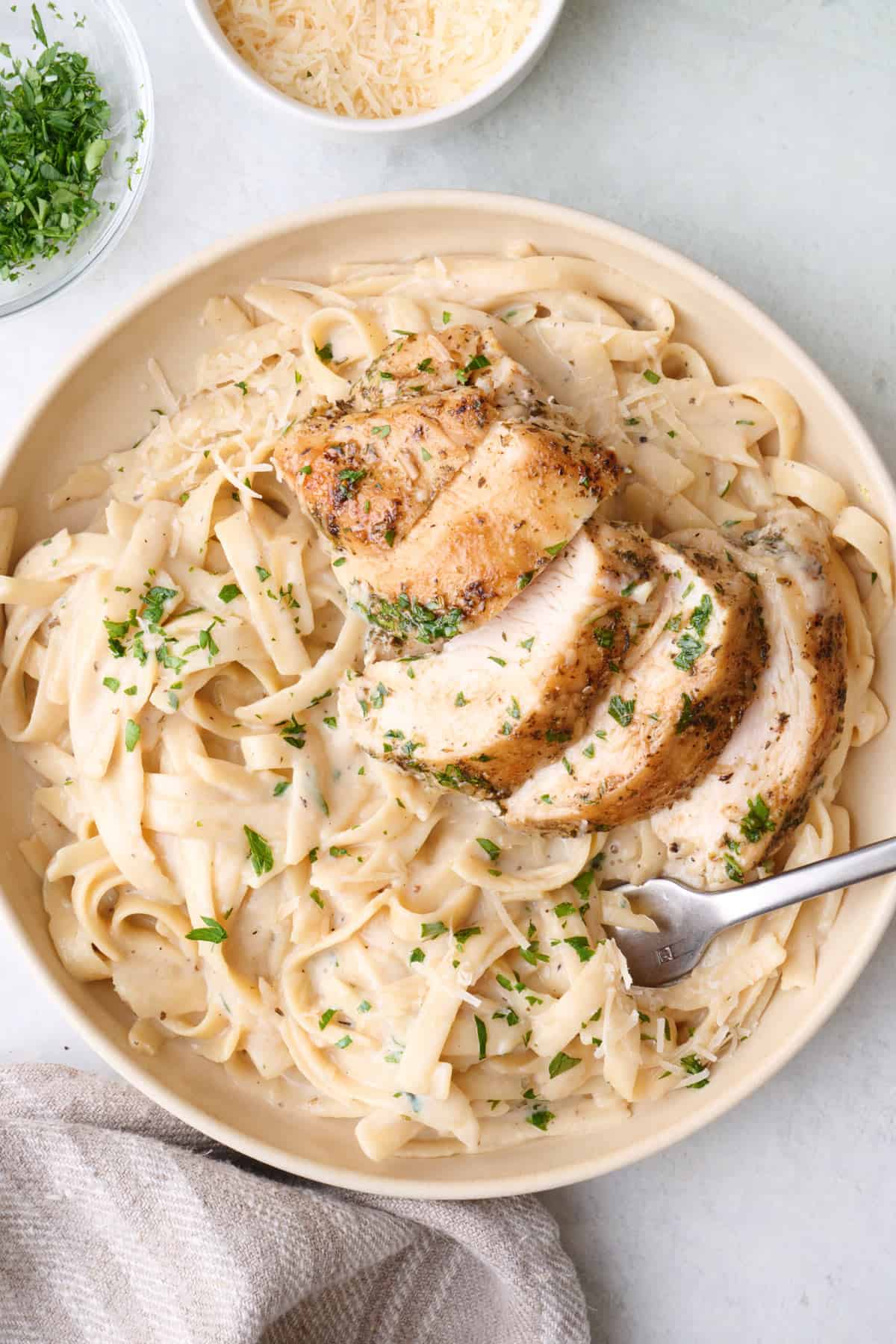 Easy chicken alfredo in a serving bowl.