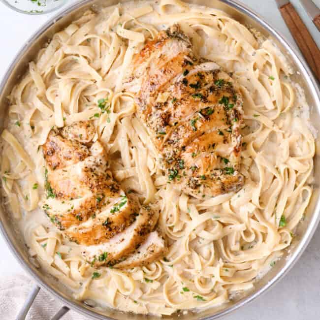 Chicken alfredo pasta recipe in a pan.