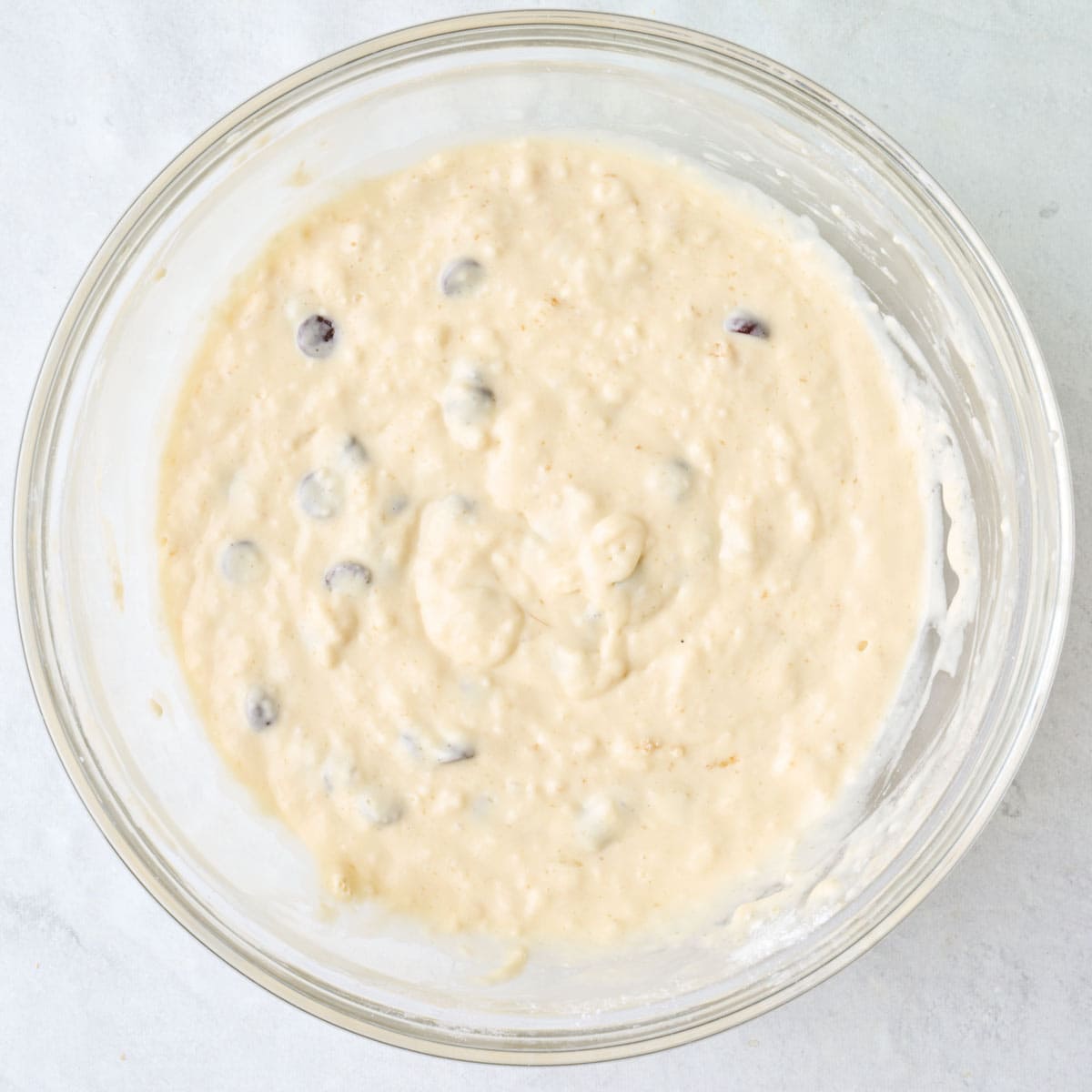 Homemade chocolate chip pancake batter in a large bowl.