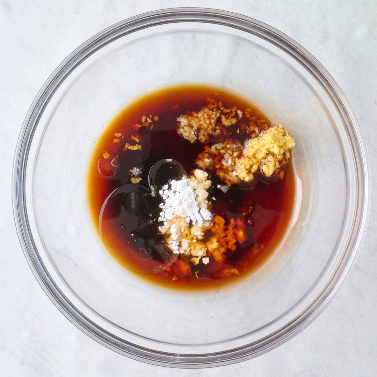 Sauce ingredients in a bowl before mixing.