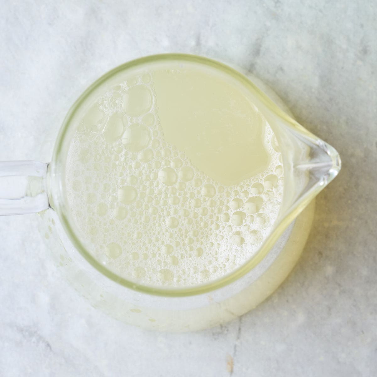 Recipe in a pitcher after syrup is added.