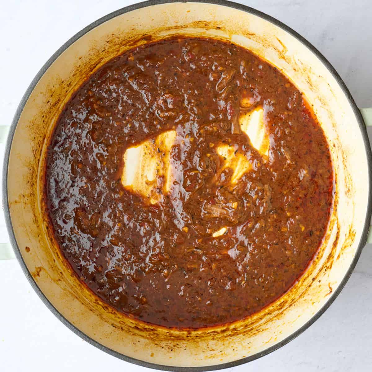 Sauce after reduced into a thicker consistency.
