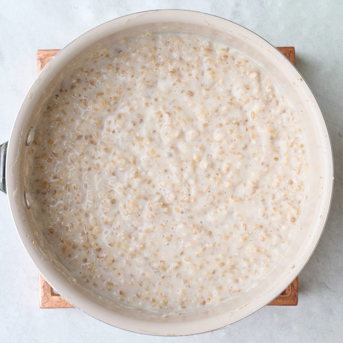 After milk is stirred into recipe.