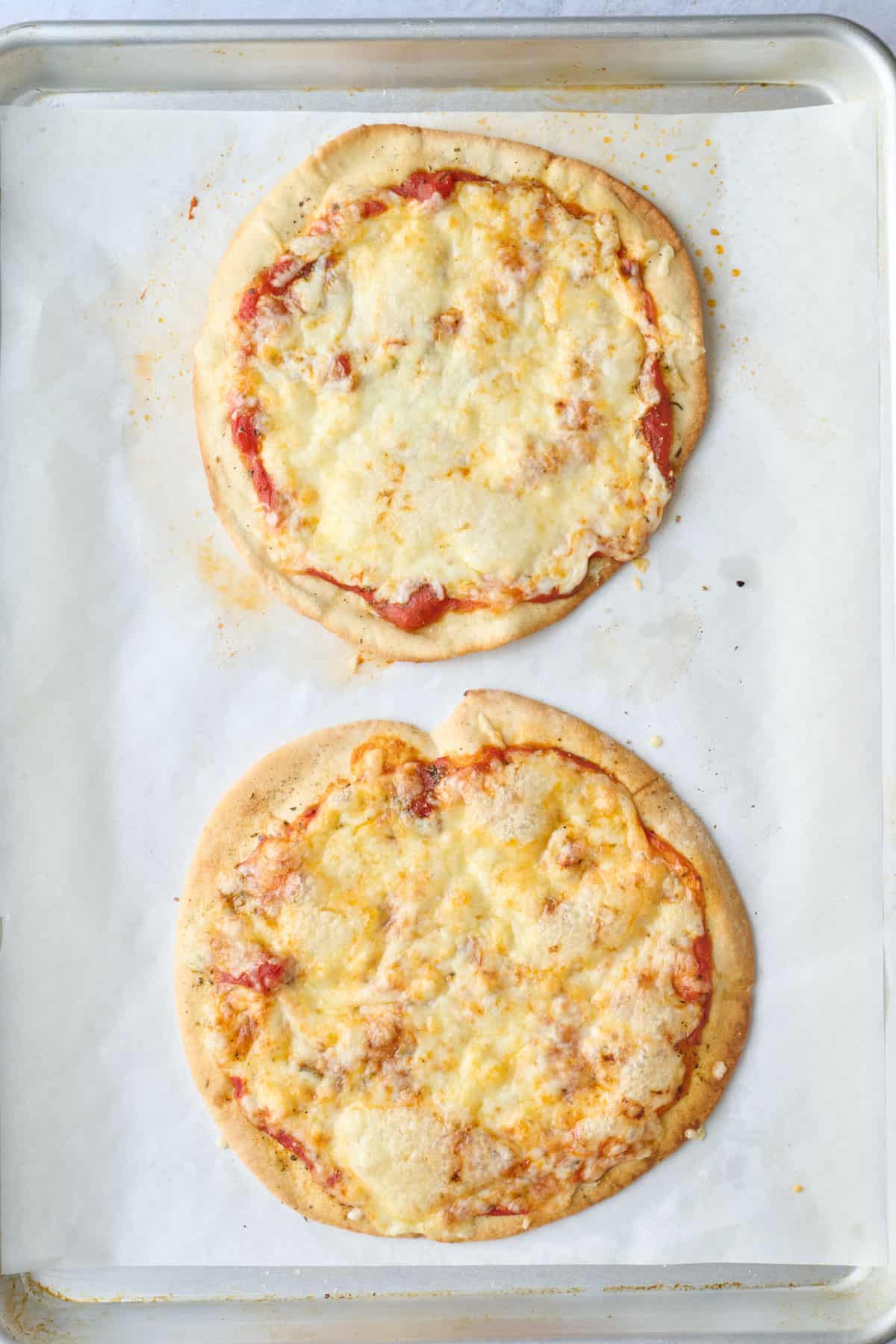 Recipe after baking with melty cheese and crisp edges.