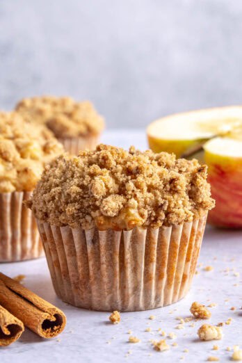 Homemade apple cinnamon muffins with crumble topping.