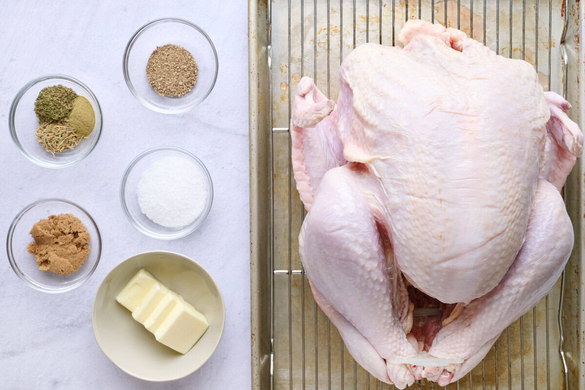 Ingredients for recipe: whole turkey, dried herbs, brown sugar, kosher salt, and butter.