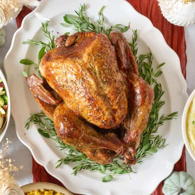 Dry brined turkey recipe on a platter.