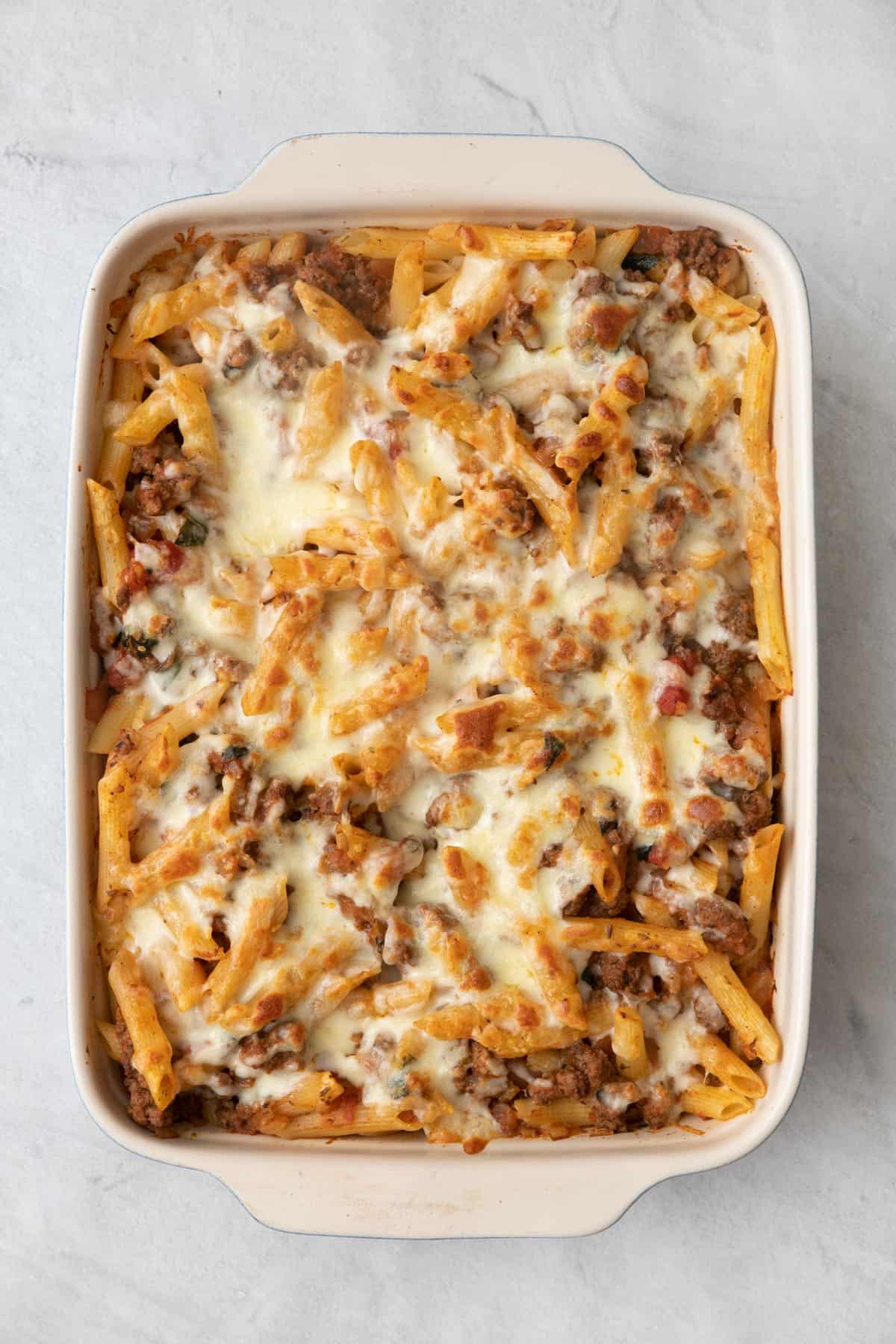 Casserole after baked to show golden melty cheese.