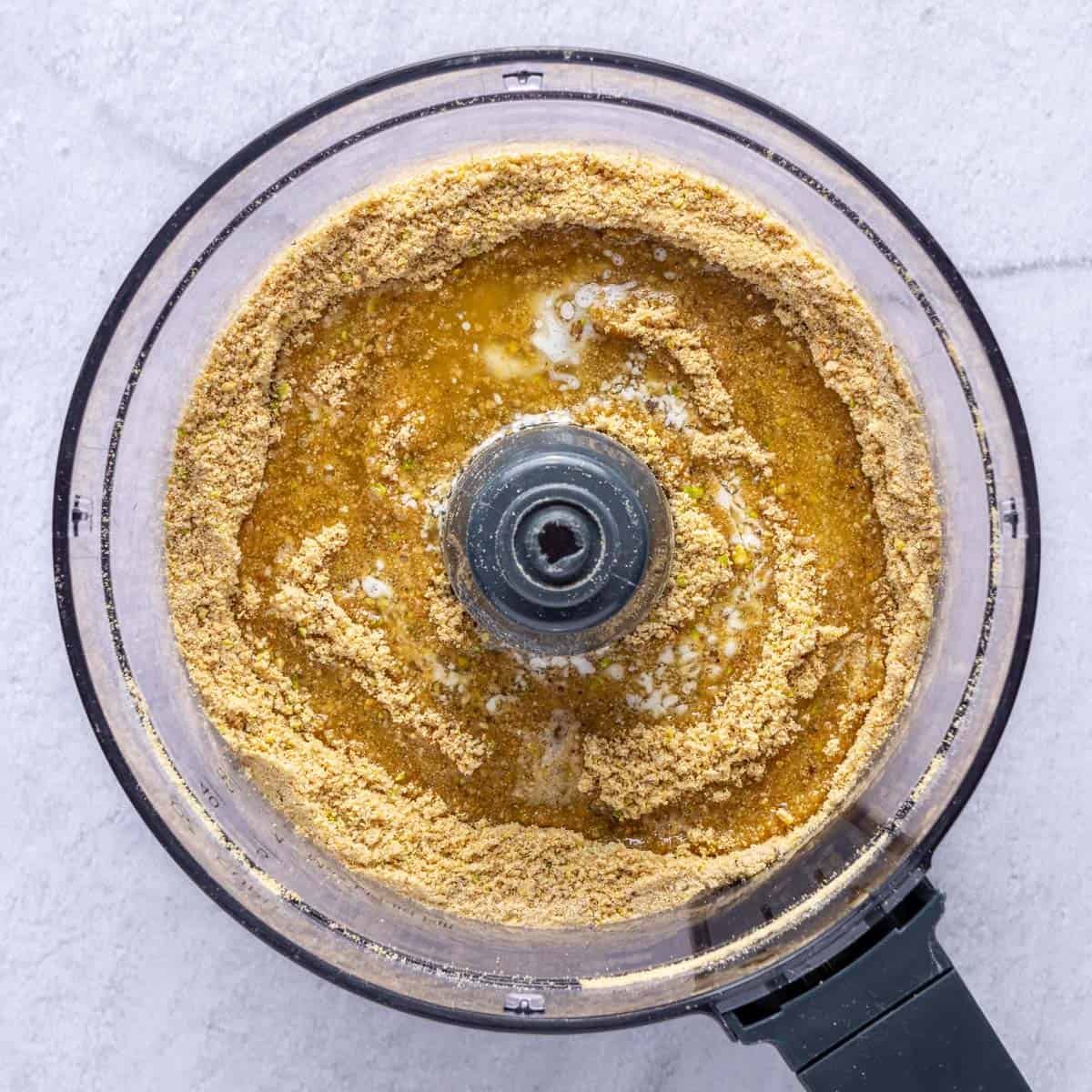 Melted butter added to crumb mixture.