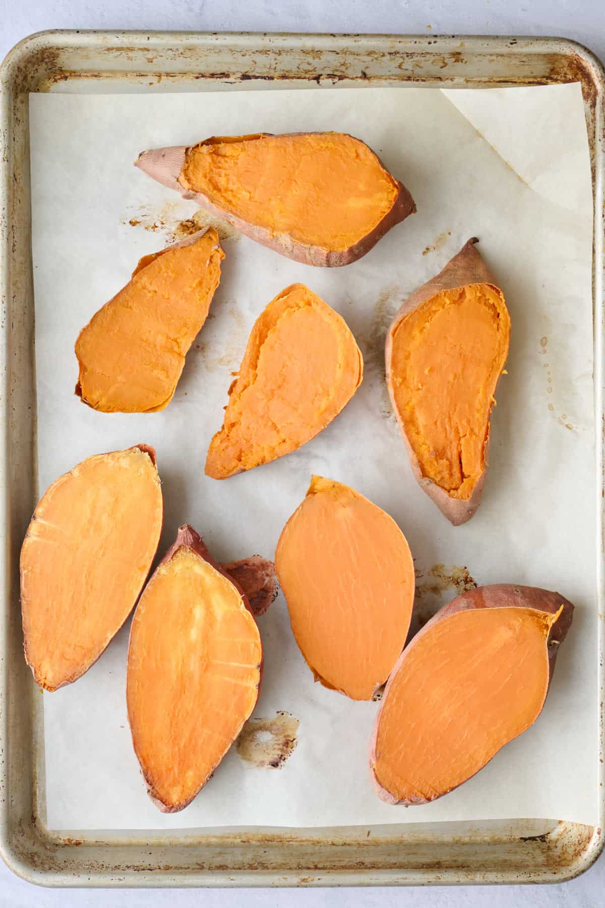 Potatoes after baking and split in half.