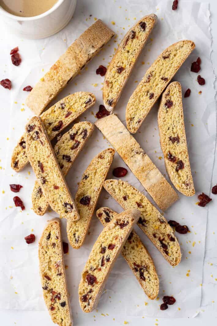 Best cranberry orange biscotti with a cup of coffee nearby.