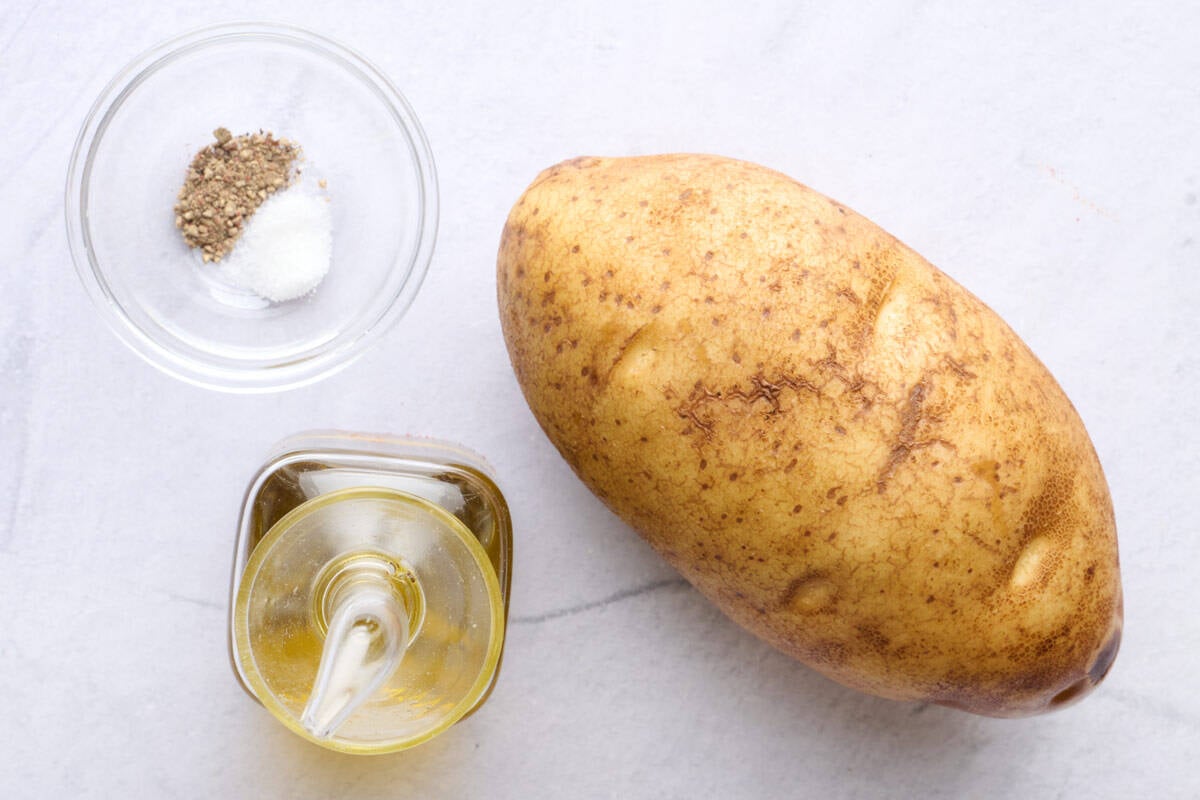 Ingredients for microwave recipe: potato, oil, salt and pepper.