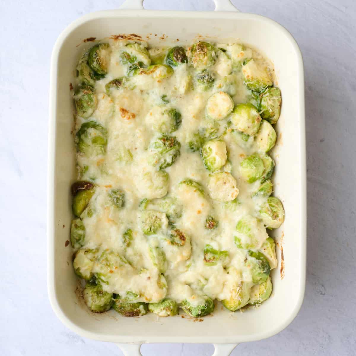 Brussel sprout recipe after roasting until cheese is melty.