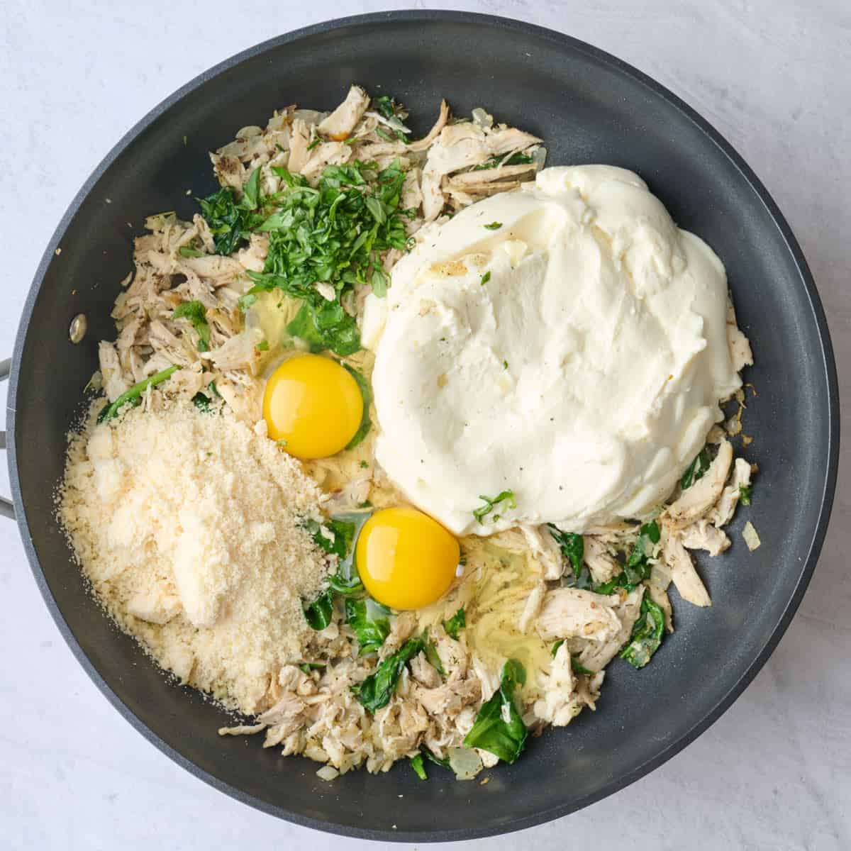 Ricotta, eggs, parmesan and chopped basil added to chicken and spinach filling.