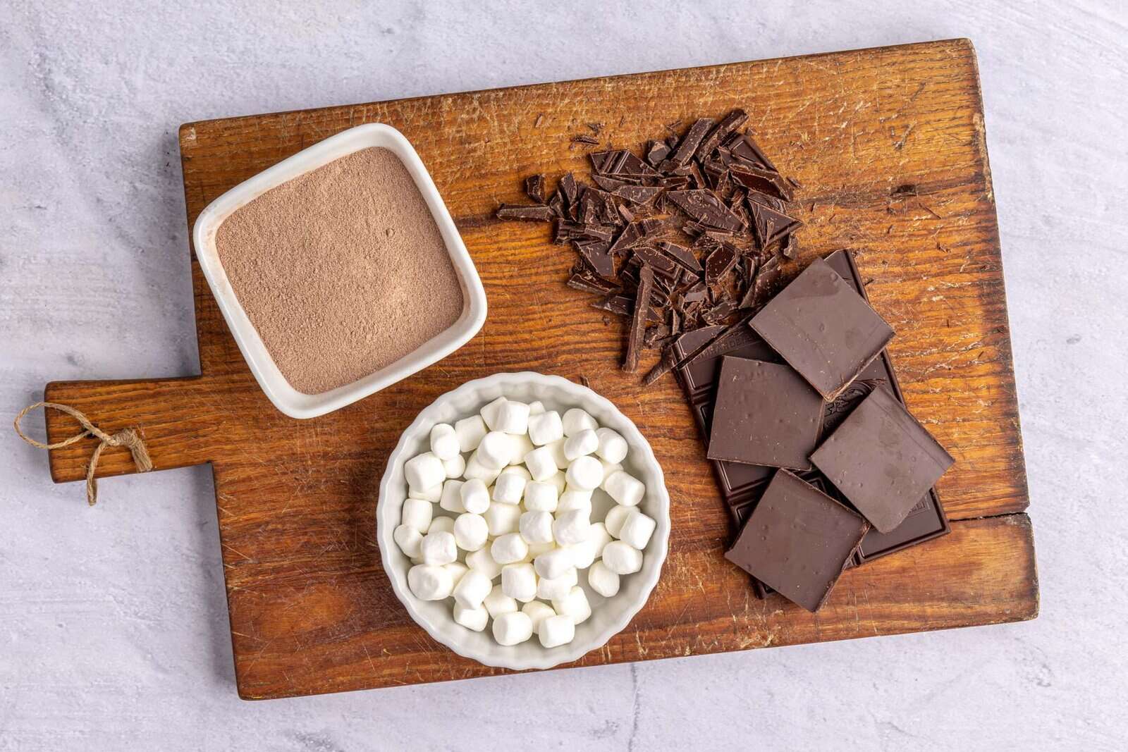 Ingredients for recipe: hot cocoa mix, marshmallows, and chocolate.