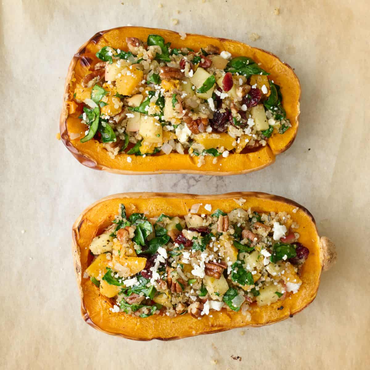 Butternut squash after stuffing with filling and warming in the oven.