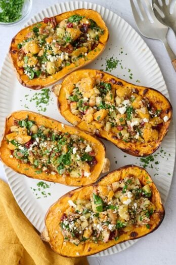 Easy stuffed butternut squash recipe filled with a quinoa, pecan, cranberry and feta filling.