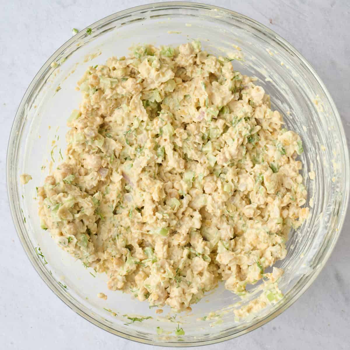 Vegan chickpea tuna salad mixture in a bowl for sandwich recipe.