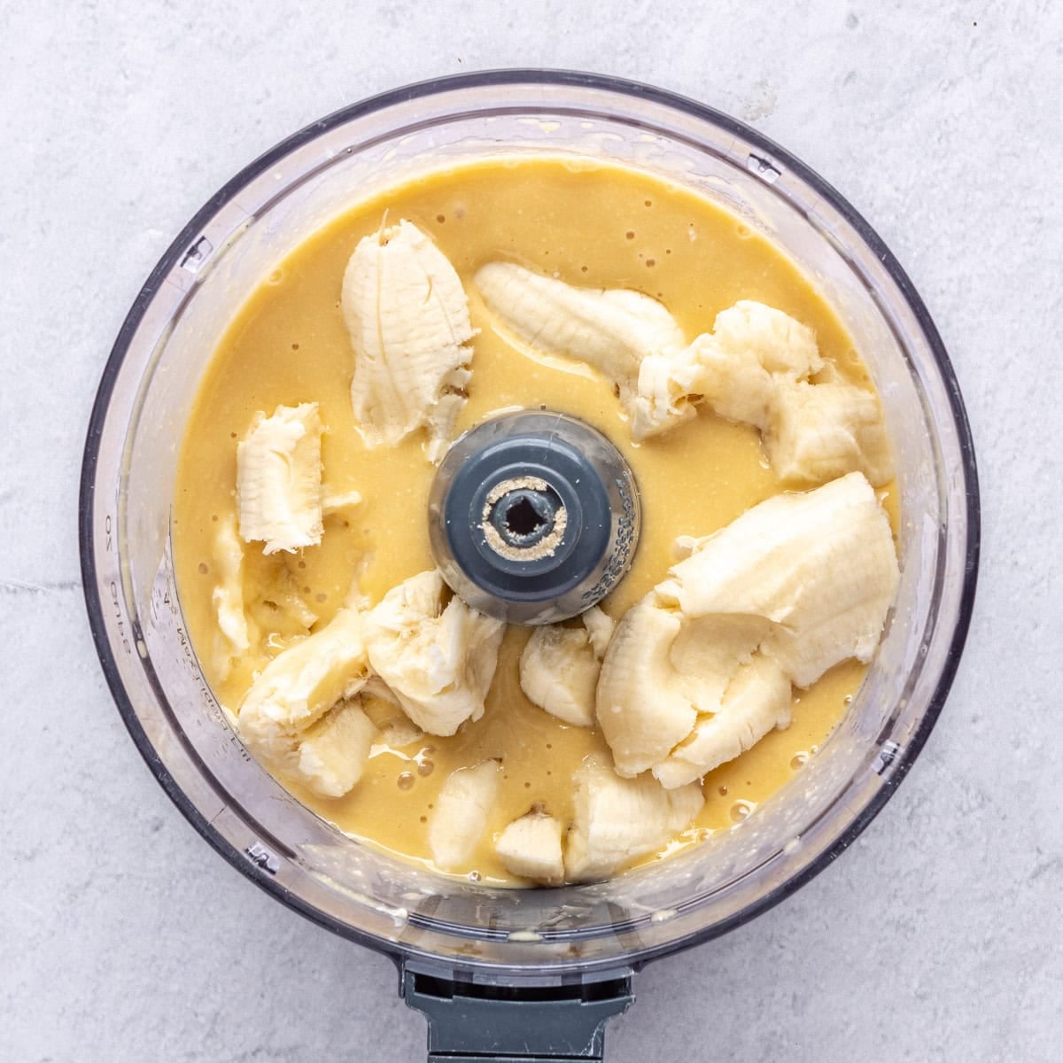 Cottage cheese mixture after processing with ripe bananas added before mixing.