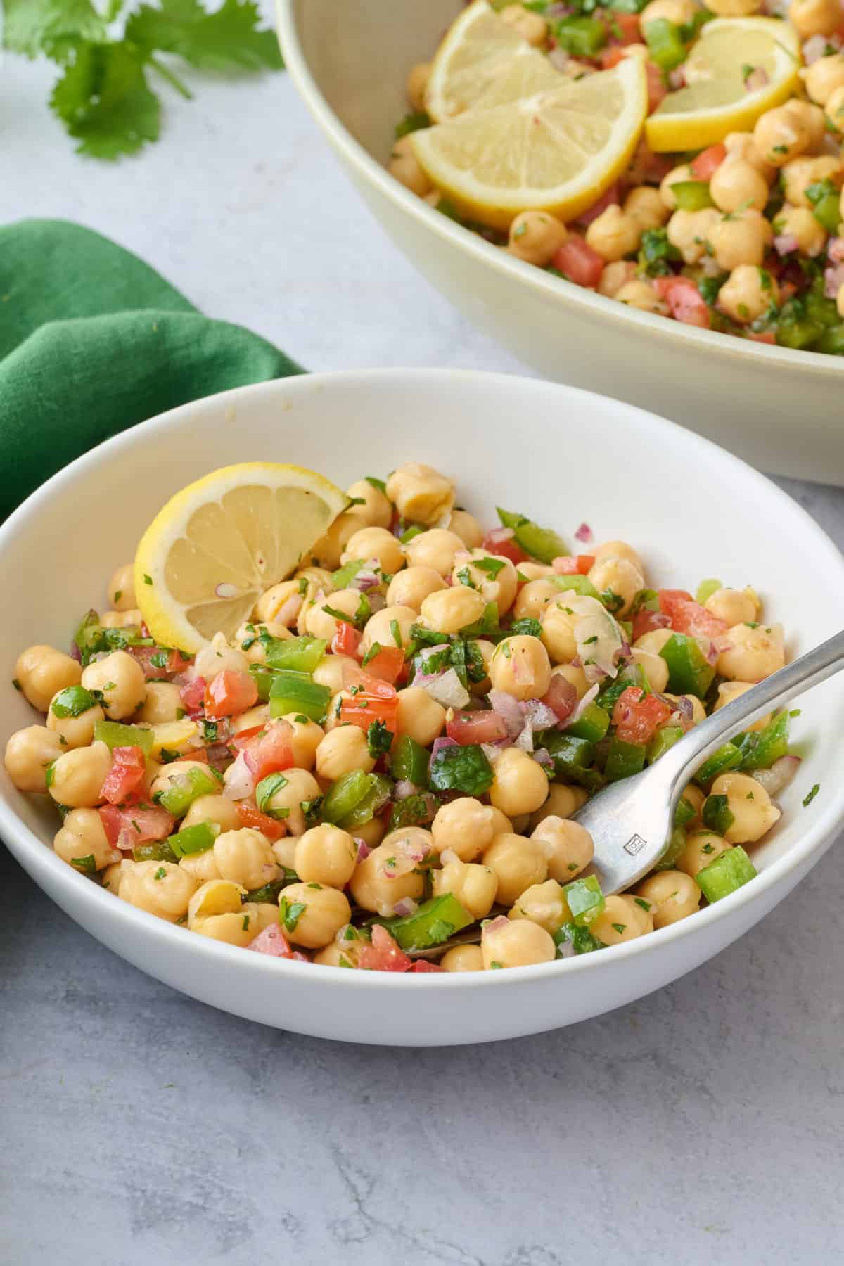 Easy balela salad side dish recipe served in a small bowl.