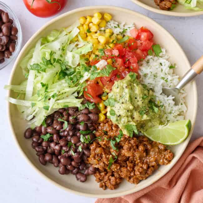 Ground beef burrito bowls with rice.