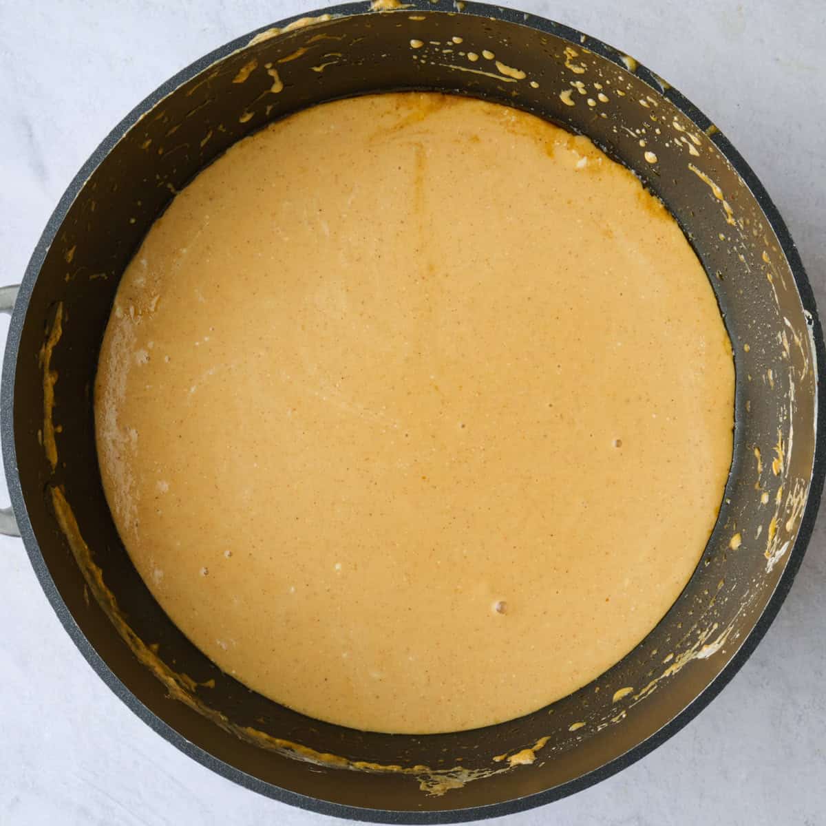 Blended cottage cheese queso after heating through.